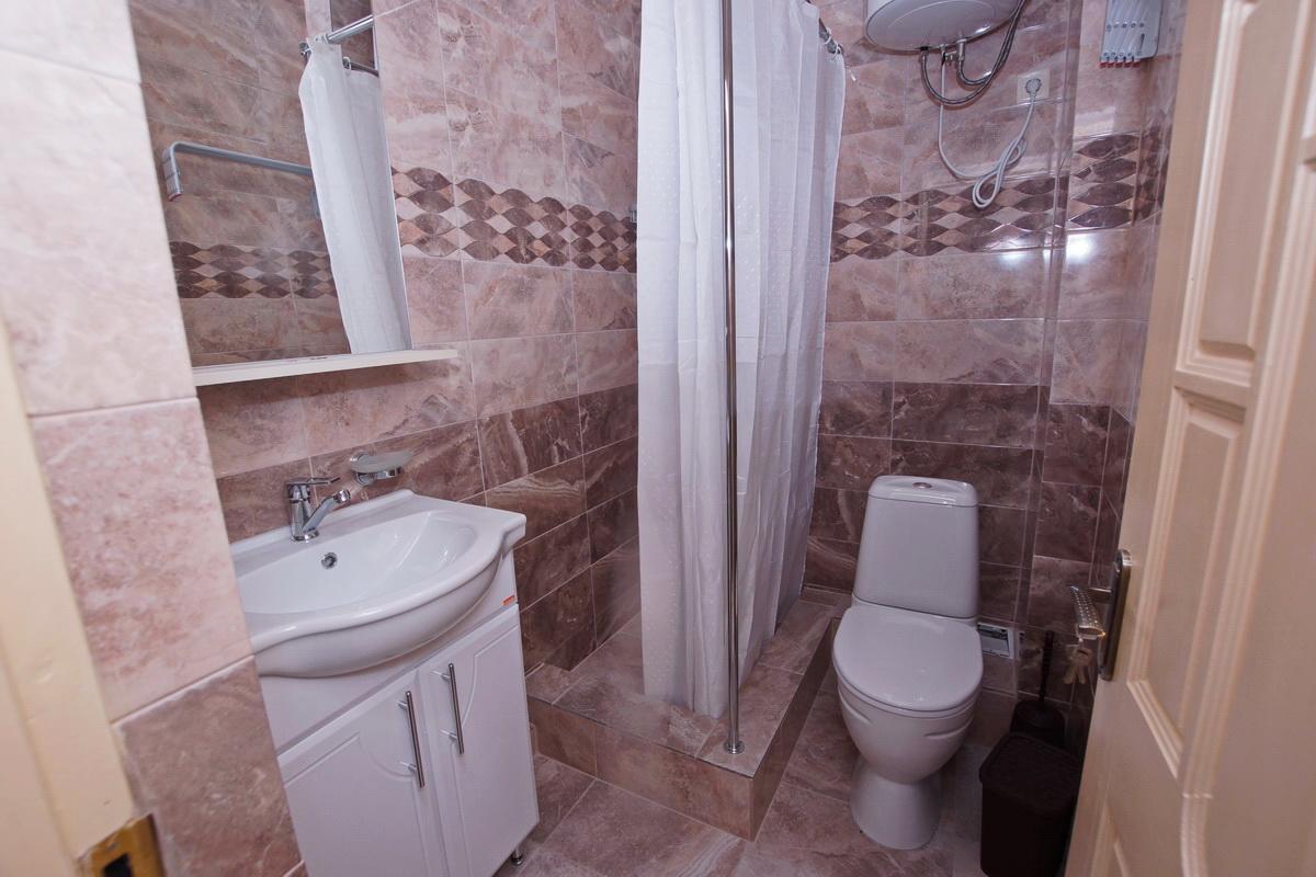 Guest House Belyi Lebed Sukhumi Exterior foto